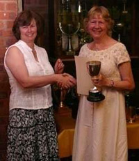 FEPS Chairman presenting the Jewell Cup to Gill Grace