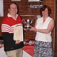 FEPS Chairman Marilyn Dennis presenting the Edith King trophy to Chris Wallace